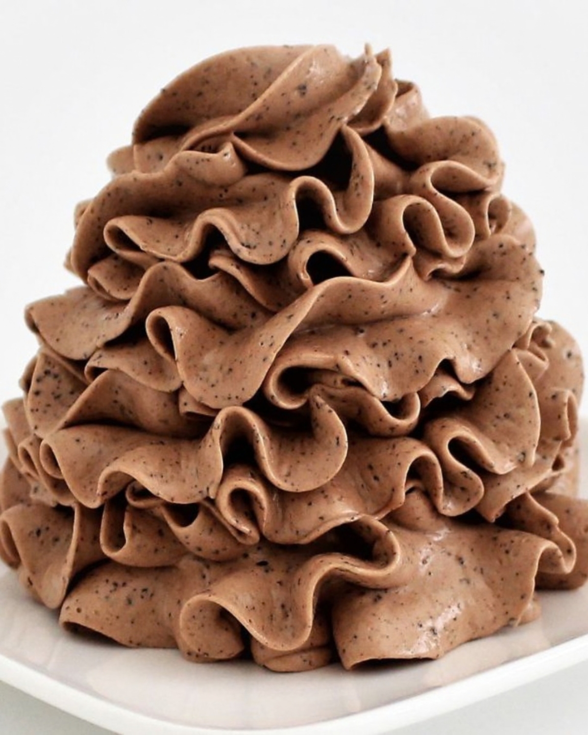 condensed milk buttercream frosting piped with a star tip