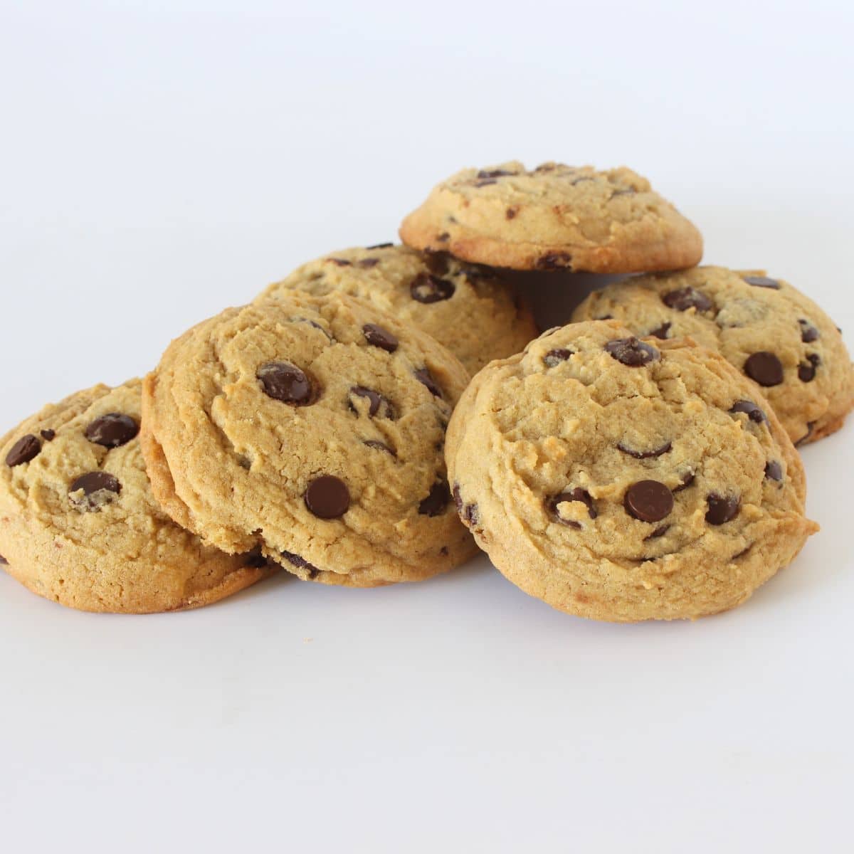 Thick and chunky chocolate chip cookies on baking tray from homemade cookie recipe