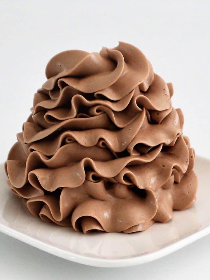 Chocolate condensed milk buttercream ruffled swirl with hot fudge