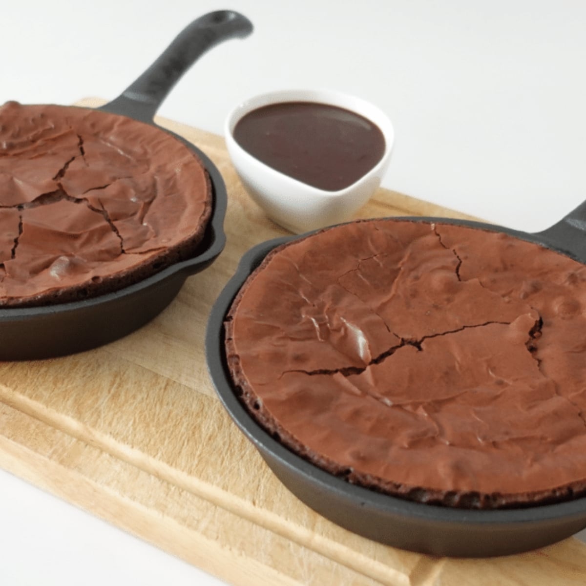 baked skillet brownie with crackly top and fudgy center