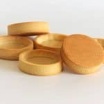 Golden baked sweet shortcrust pastry tart shells (pâte sablée) with crisp edges and smooth bases ready for filling