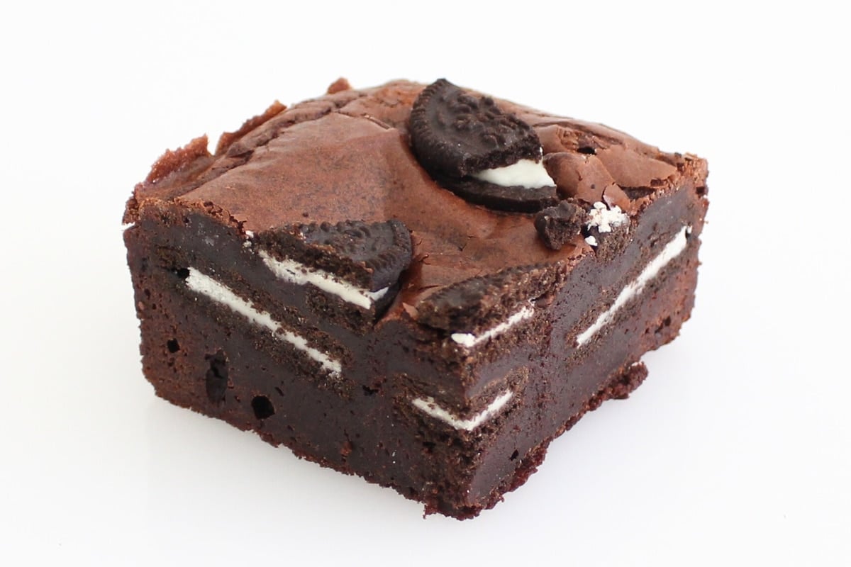 Sliced chocolate fudge brownie showing fudgy texture
