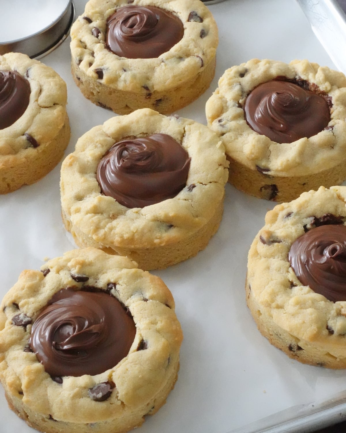 Thick Nutella deep dish cookies filled with creamy Nutella and ready to serve