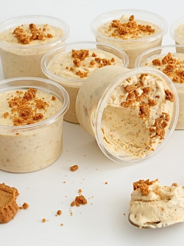 biscoff ice cream cups with cookie crumbs in clear tubs