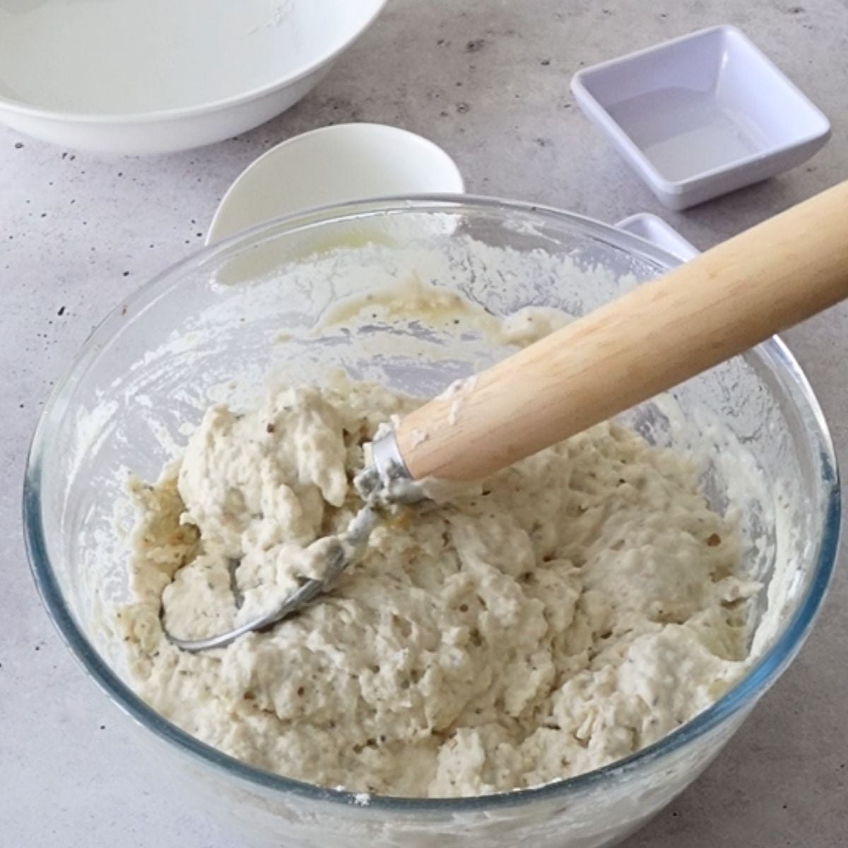 Shaggy focaccia dough with Italian herbs mixed in
